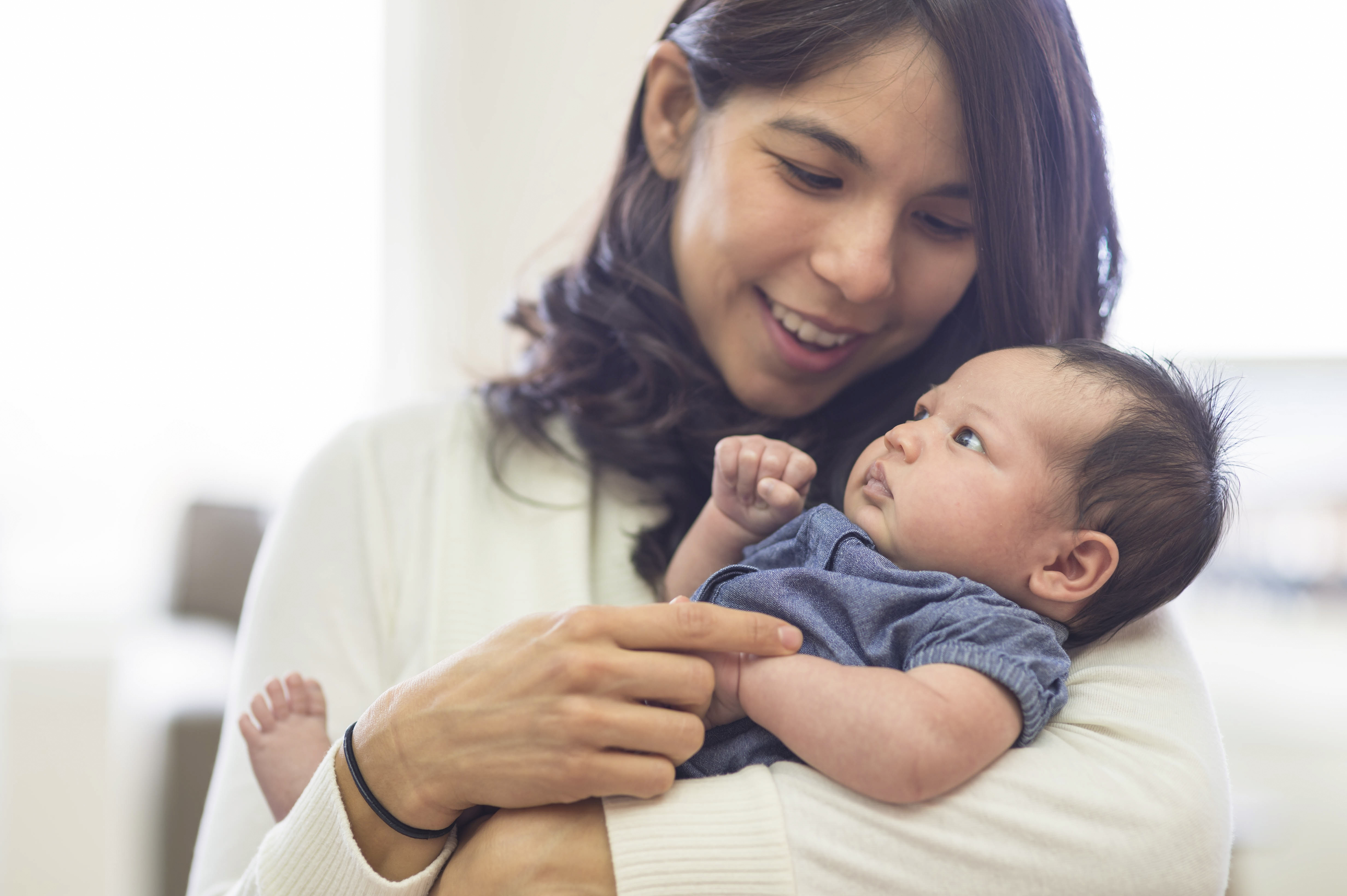 A mother holding her infant